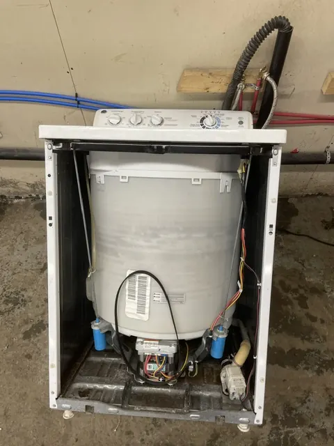 Top-load washer with its cabinet removed