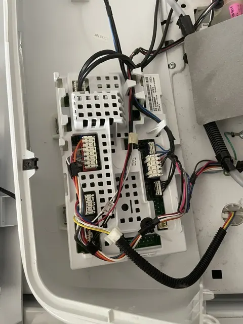 Washer control board and wiring inside the console